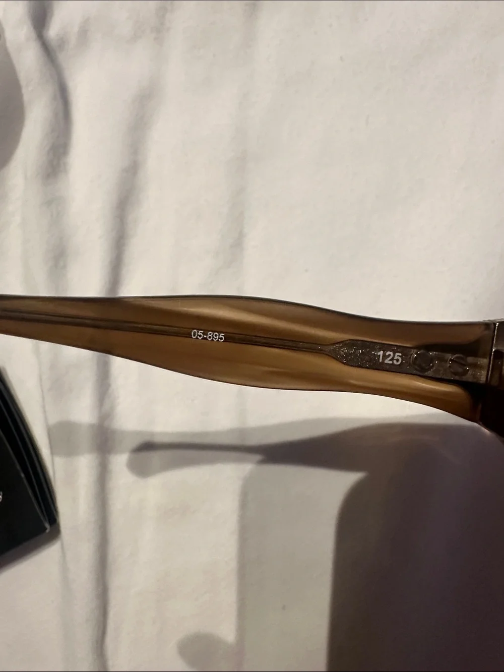 Oakley Amber Lens Translucent Brown Frame Sunglasses with White Case